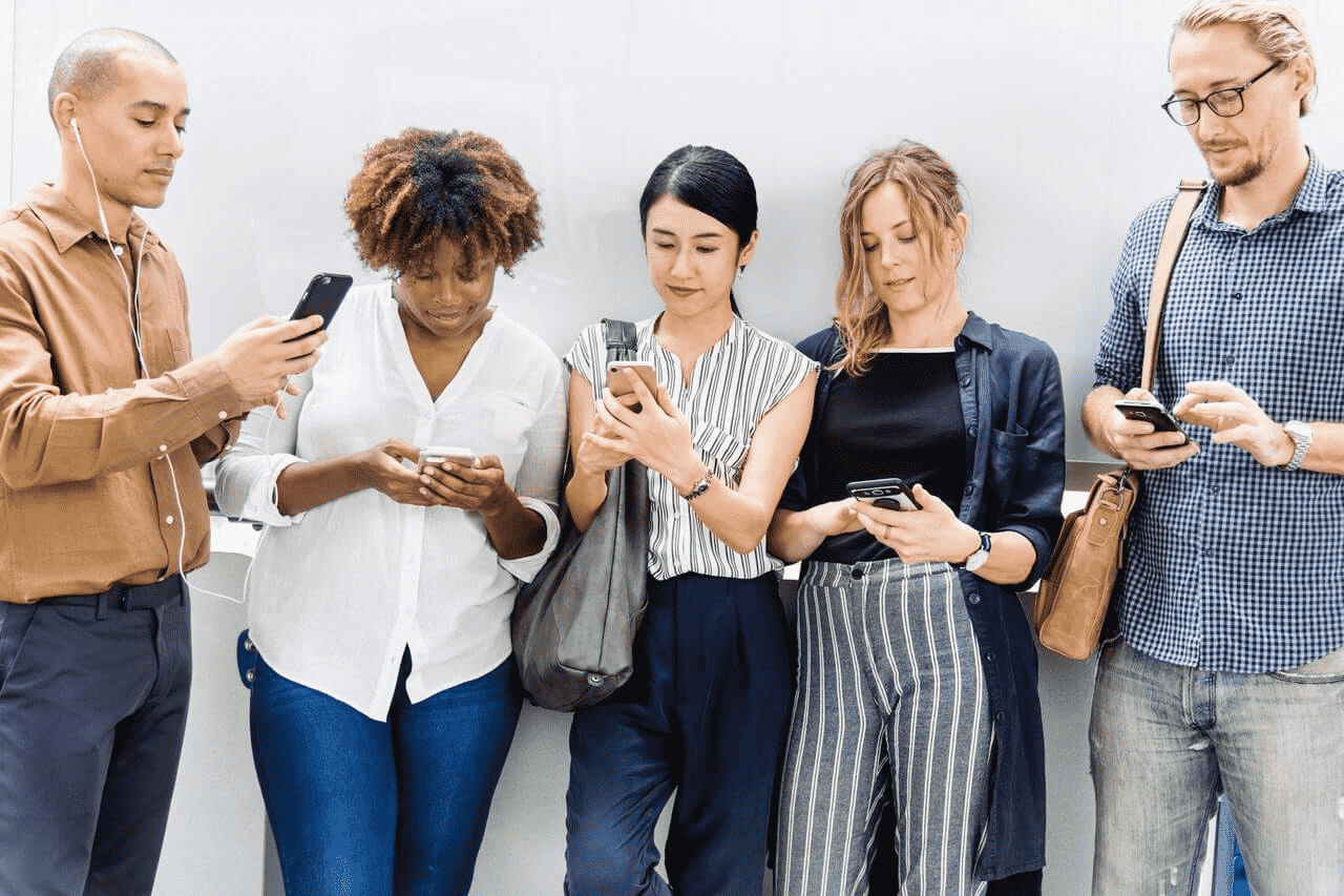 Group of people looking at phone